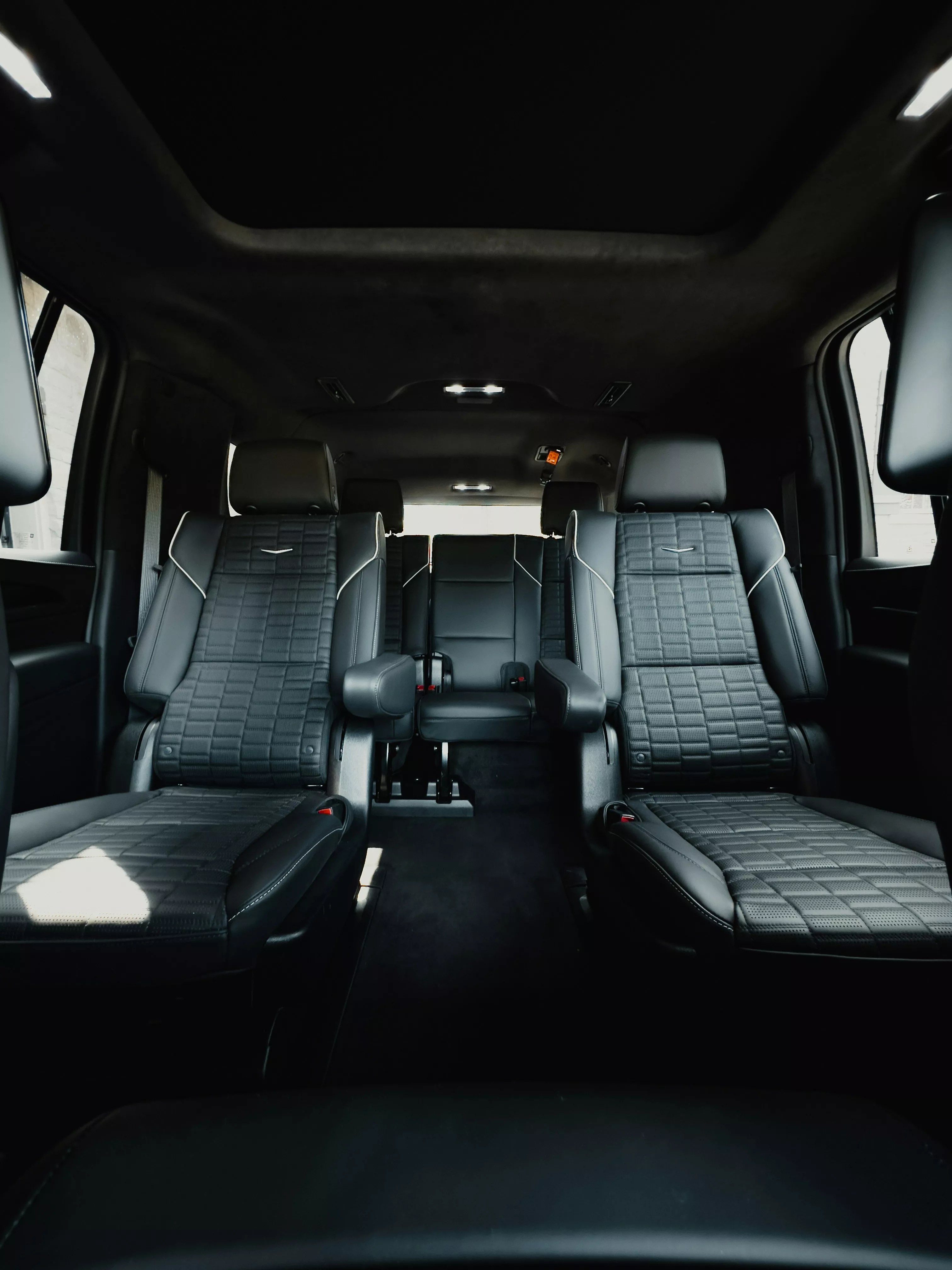 Cadillac Escalade IQ luxury rear seating interior for Ghost Carriage chauffeur clients