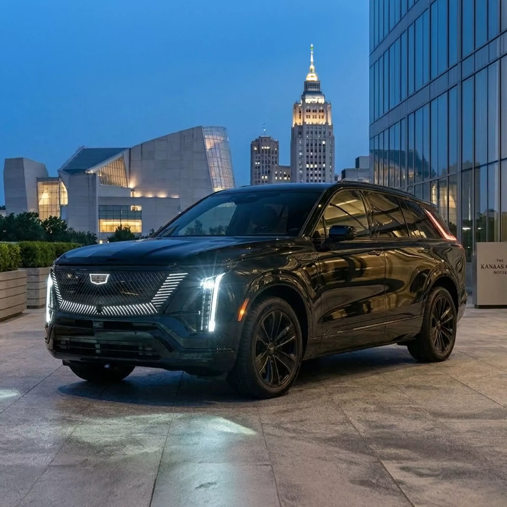 Cadillac Vistiq at a Kansas City hotel at dusk for Ghost Carriage